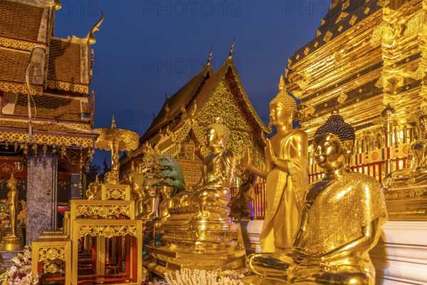 Buddha statues in the Buddhist temple complex Wat Phra That Doi Suthep, landmark of Chiang Mai at
