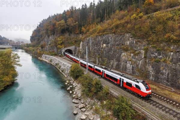 Train of the S-Bahn Vorarlberg of the Austrian Federal Railways ÖBB Eisenbahn Nahverkehr in autumn