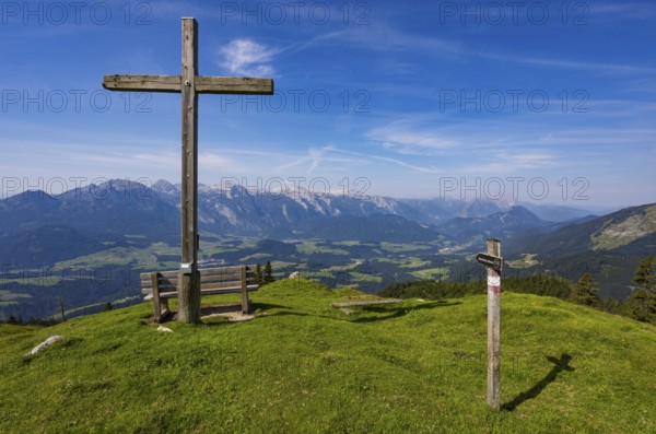 Summit cross on the Taborberg with a view of the Lammertal and Tennengebirge mountains, Osterhorn
