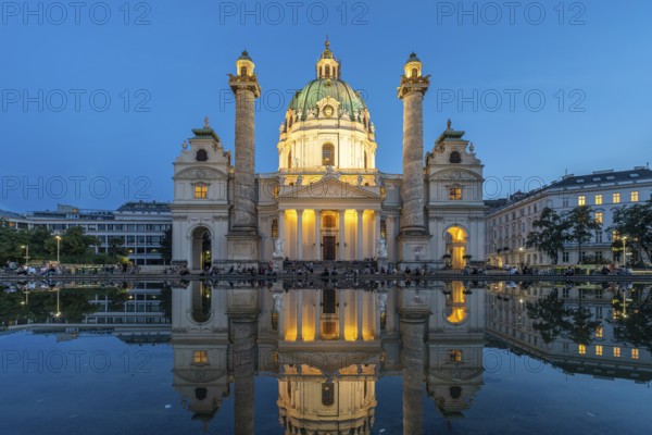 The baroque Karlskirche church at dusk, Vienna, Austria, Europe