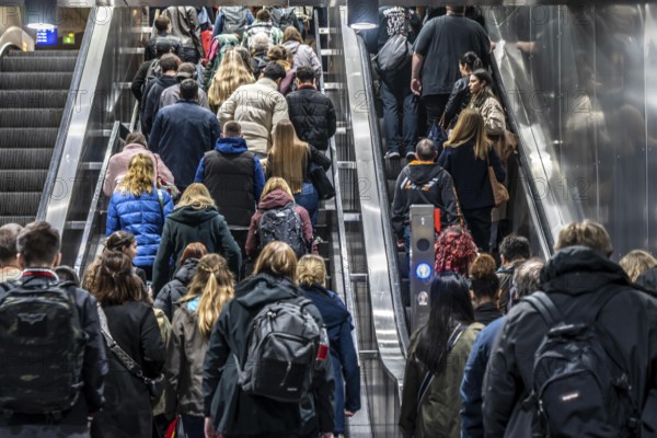 Public transport, underground, main station exit, many people crowding out of the underground
