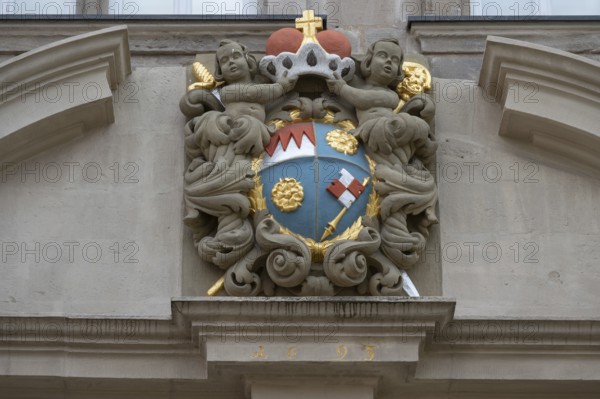Coat of arms cartouche from 1693 above the portal of the Knauf Museum, market square, Iphofen,