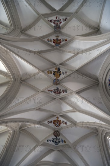 Vault with coat of arms in the late Gothic mortuary, burial place of the cathedral canons,