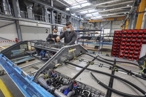 Herten, North Rhine-Westphalia, Germany, Cummins Hydrogenics fuel cell factory. Employees assemble
