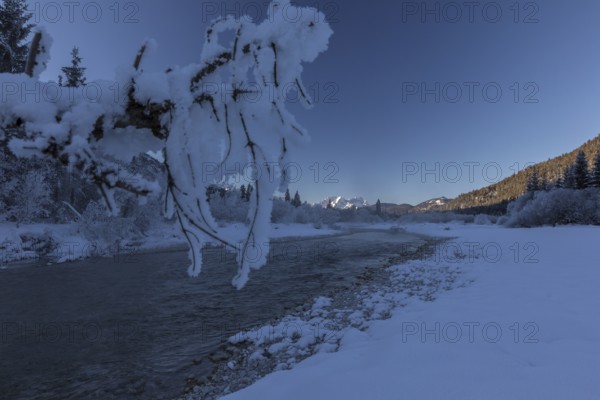 Isar valley in winter at temperatures of minus 18 degrees Celsius. Snow covered landscape with the