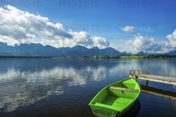 Green rowing boat, Hopfensee, Hopfen am See, near Füssen, Ostallgäu, Allgäu, Bavaria, Germany,