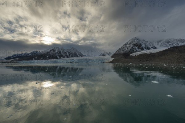 Mountains and glacier edge of Monacobreen, Liefdefjord, Woodfjord area, Spitsbergen Island,