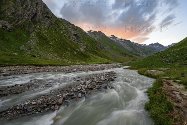 Umbaltal valley with Isel mountain stream at sunset, Venediger Group, Hohe Tauern National Park,