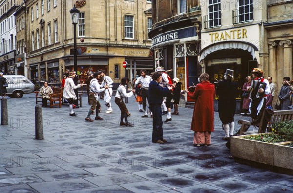 Morris dancers performing in Stall Street, Bath, Somerset, England, UK 1976 in front of the Tranter