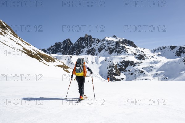Ski tourers on the Graubünden Haute Route, Snow-covered mountains, Winter in the Albula Alps,