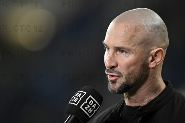 Coach Christian Ilzer TSG 1899 Hoffenheim Portrait in interview Microphone Micro Logo DAZN PreZero