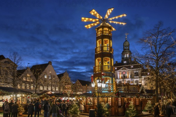 Large Christmas pyramid at the Christmas market on the market square, behind the historic town