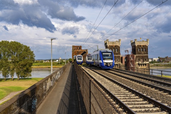 The railway bridge Duisburg-Hochfeld-Rheinhausen, over the Rhine, regional trains and many goods