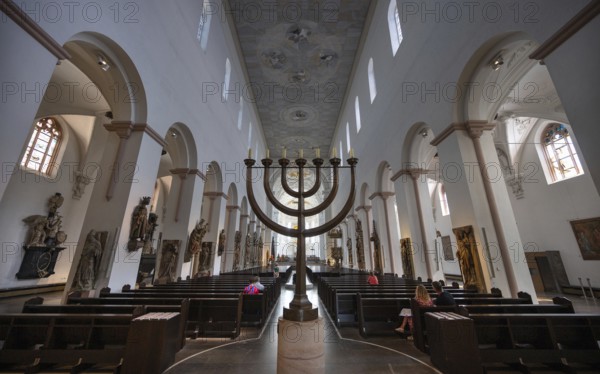 Interior of St Kilian's Cathedral, menorah in the centre aisle of the cathedral, created by Andreas