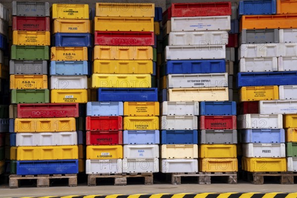 The town harbour of Sassnitz, island of Rügen, boxes of fish waiting for the new catch, at the