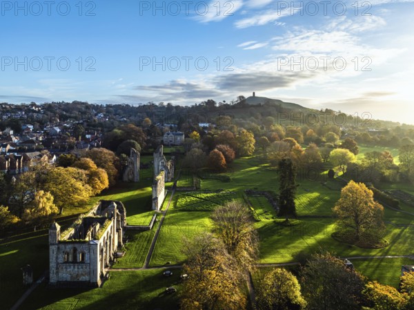 Sunrise over Glastonbury Abbey from a drone, Glastonbury, Somerset, England, United Kingdom, Europe