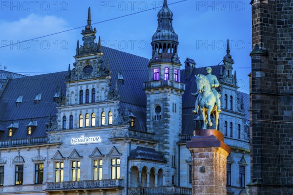 The Bismarck monument at Bremen Cathedral and the Manufactum building at dusk, Free Hanseatic City