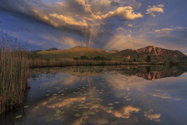Mountains reflected in lake, cloudy mood, evening light, Kochler mountains, Loisach-Lake Kochel