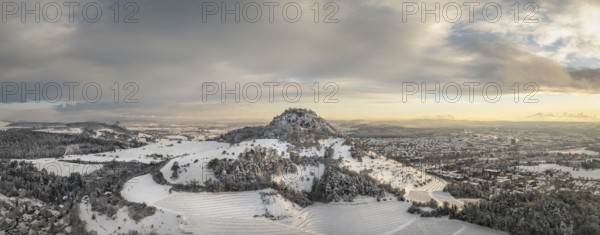 Aerial view, panorama of the snow-covered Hegau volcano Hohentwiel with Germany's largest castle