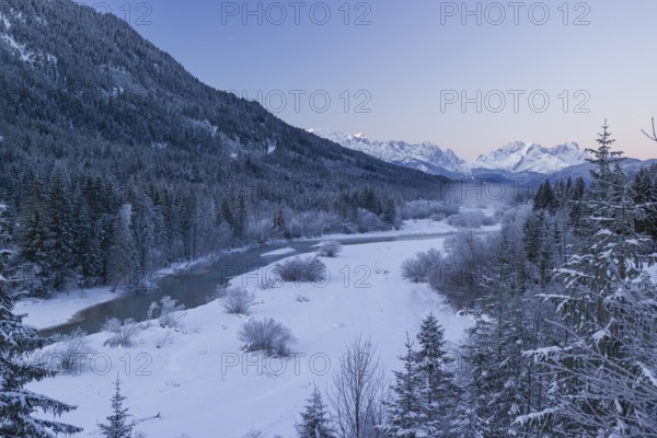 Isar valley in winter at temperatures of minus 18 degrees Celsius. Snow covered landscape with the