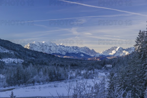 Isar valley in winter at temperatures of minus 18 degrees Celsius. Snow covered landscape with the