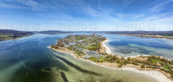 Aerial view, panorama of the island of Reichenau at low tide and spring-like vegetation, Lake