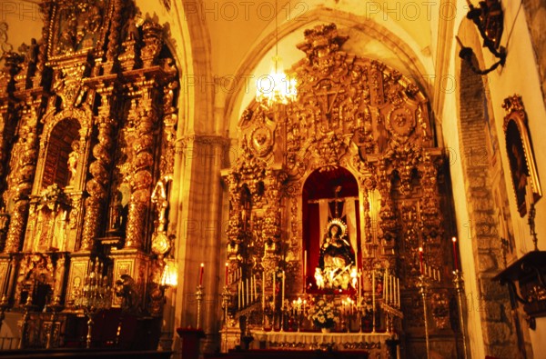 Elaborately decorated gold altar in the cathedral church of Santa Maria La Mayor, Ronda, Andalusia,