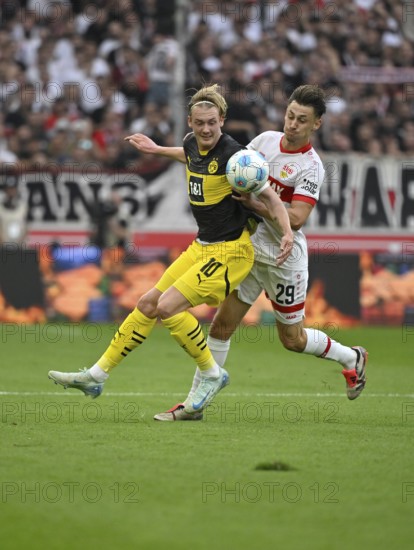 Duel, action Anthony Rouault VfB Stuttgart (29) against Julian Brandt Borussia Dortmund BVB (10)