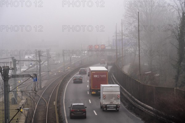 Dense fog, with visibility sometimes less than 100 metres, A40 motorway, city passage in Essen,