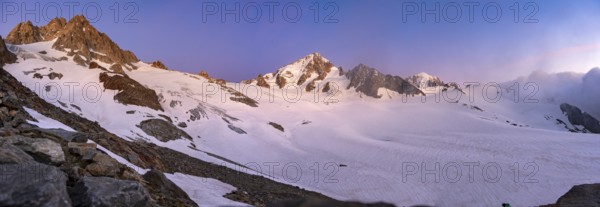 High alpine mountain landscape at sunset, Glacier du Tour, glacier and mountain peak, summit of the