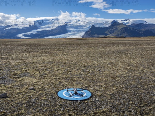 Drone on a landing pad, glacial floodplains of the Vatnajökull glacier, glacier Vatnajökull,