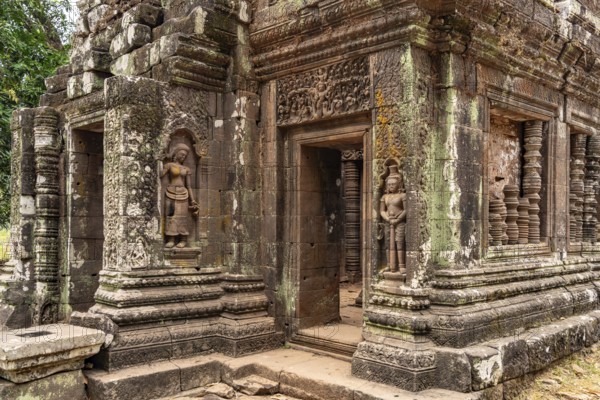 Apsara reliefs at the sanctuary of the mountain temple Wat Phu, Champasak province, Laos, Asia