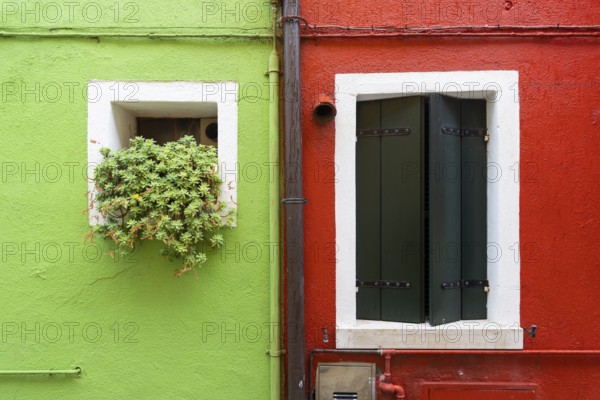 City view of Burano with colourfully painted houses and canals. Burano, Venice, Veneto, Italy,