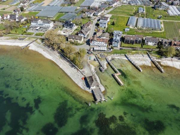 Aerial view of the southern part of the island of Reichenau at low tide and spring-like vegetation,