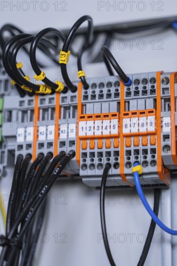 Detailed view of individual circuit-breakers in a larger electrical system, professional technology