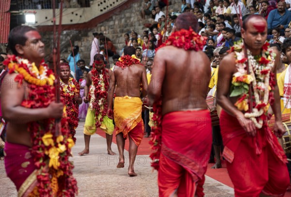 GUWAHATI, INDIA, AUGUST 19: Priests dance in the beat of Dhol (Drum) during the annual