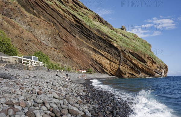On the beach of Garajau, Ponta do Garajau stone beach, bathing beach, cliffs, Garajau, municipality