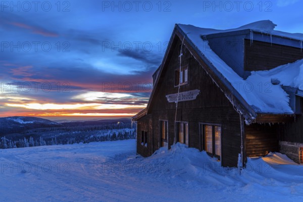 Wossecker Baude at dusk on a winter's day, Harrachsdorf in the Giant Mountains, Czech Republic,