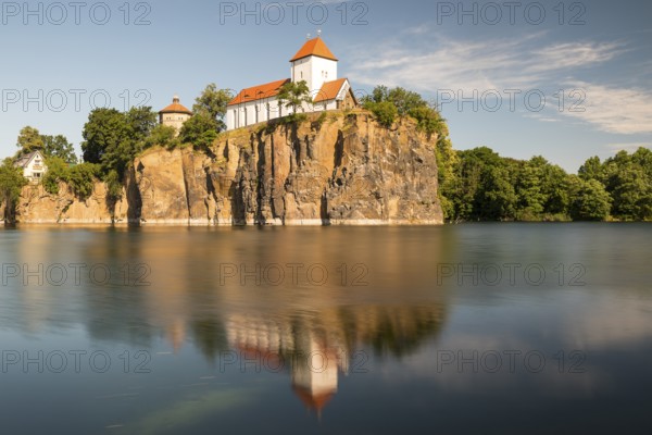 Kirchbruch lake and mountain church with water tower, Beucha, Leipzig district, Saxony, Germany,
