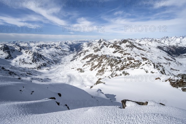 View from the summit of Piz Grialetsch in winter, mountain panorama with Dürrboden valley and view