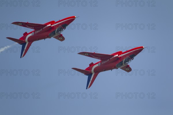 BAE Systems Hawk two aircraft of the RAF Royal air force Red Arrows display team flying, England,