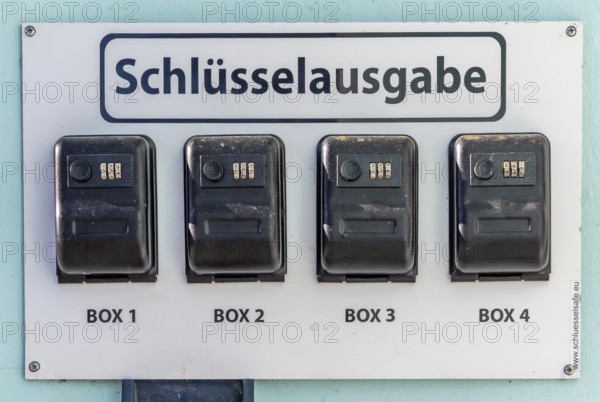 Key distribution boxes, safes, at a small hotel, guests receive a code with which they can open the