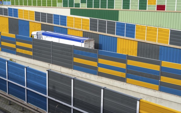 Colourful noise barriers on the A52 motorway, at the Essen-Rüttenscheid junction, the noise