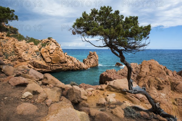 Red rocks and sea, Spiaggia di Coccorocci, near Tertenia, Province of Ogliastra, Sardinia, Italy,