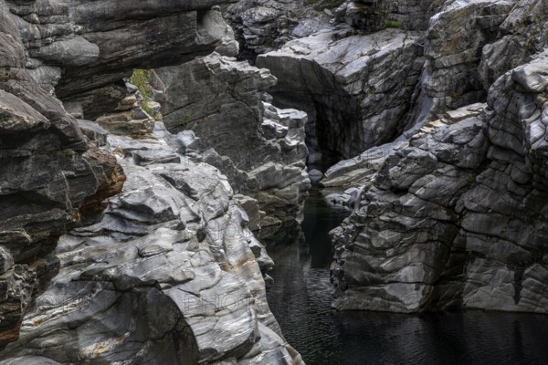 Rocks, granite rock formations in the Maggia River near Ponte Brolla, in the Maggia Valley, Valle