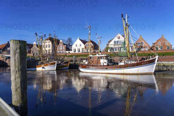 The fishing village of Greetsiel, historic fishing harbour, with the largest shrimp cutter fleet in