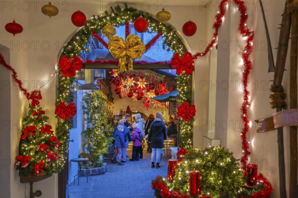 Christmas decorated passage to the mulled wine stand in the side passage at the Christmas market,
