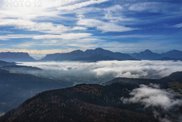 View from Schwarzenberg to a sea of fog in the Salzach valley with Watzmann and Untersberg,