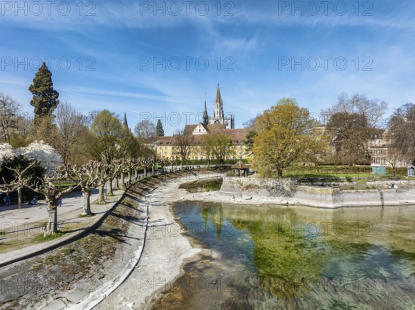 Aerial view of the old town of Constance with the island canal at low tide, on the left the
