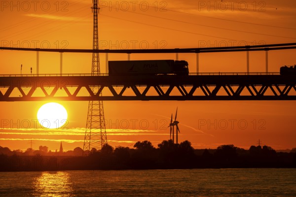 Traffic on the Rhine bridge Emmerich, federal road B220, evening light, with 803 m the longest